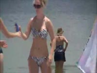 sexy mom and teen daughter at beach